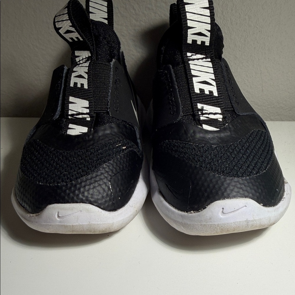 Nike Kids Black and White Slip-On Sneakers